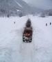 Un train qui circule dans 3 metres de neige