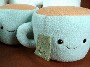 Deux gros poufs design en forme de tasse de the