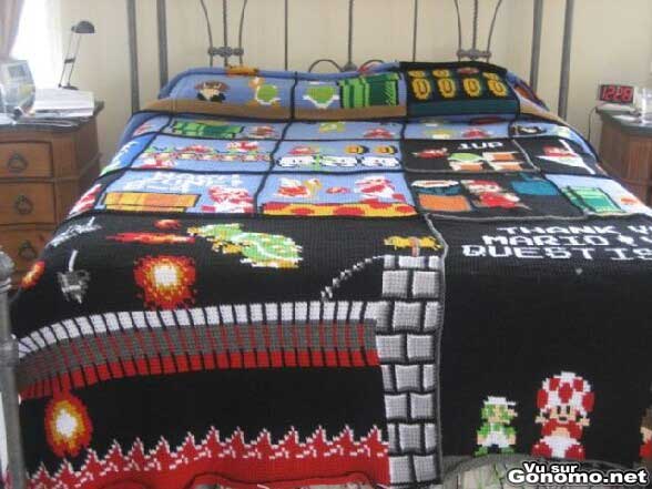 La belle couverture de lit d un geek. Excellent ! :)